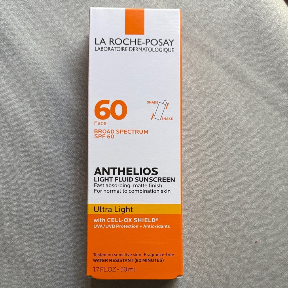 Anthelios Light Fluid Sunscreen SPF 60 - Orange and White
